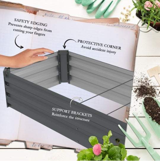 ZenGrow Premium Raised Bed — dark gray finish in styled backyard setting