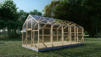Wooden greenhouse structure on a grassy area with trees in the background