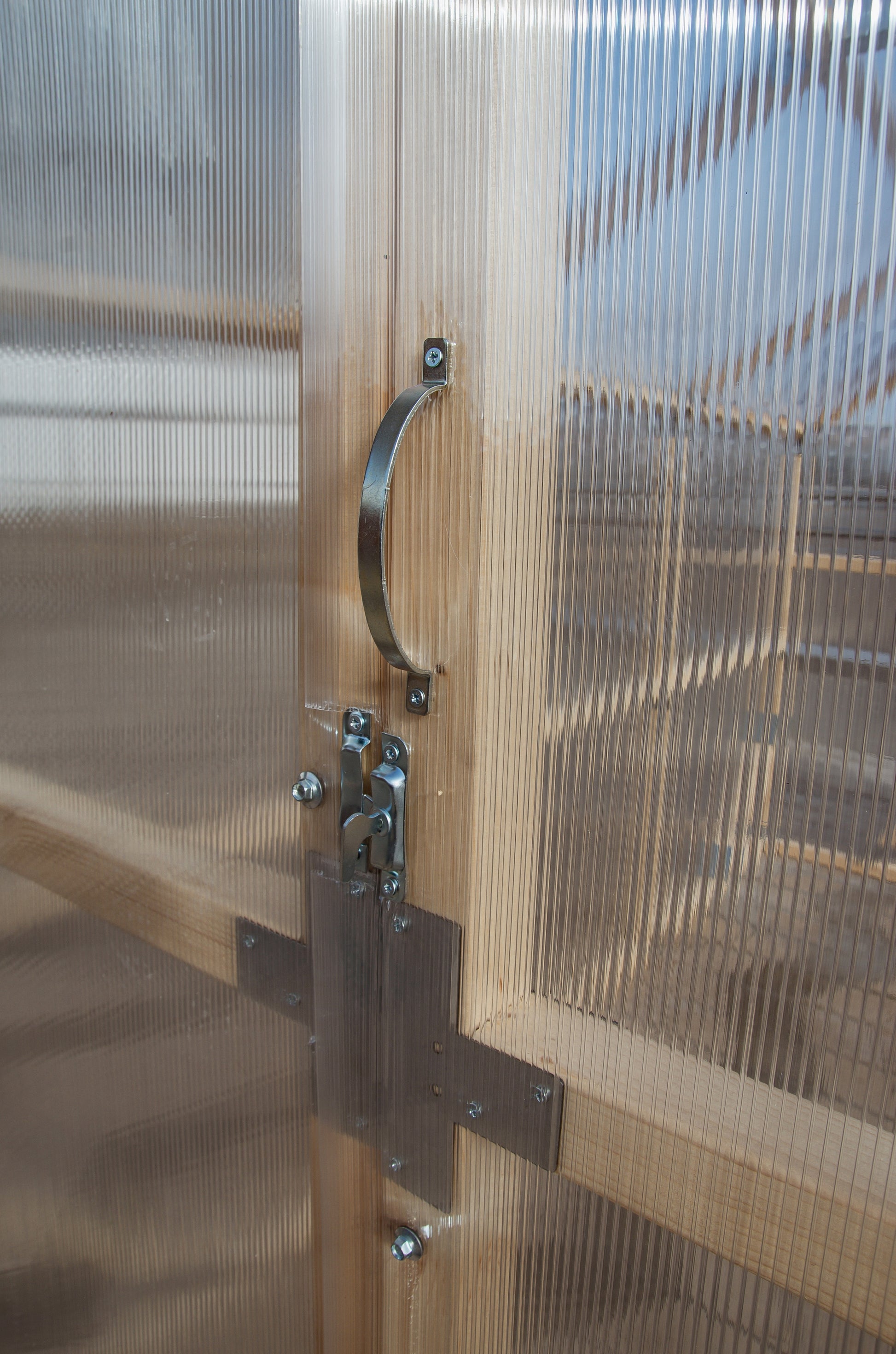Casa Wooden Greenhouse — door handle and latch on polycarbonate panel