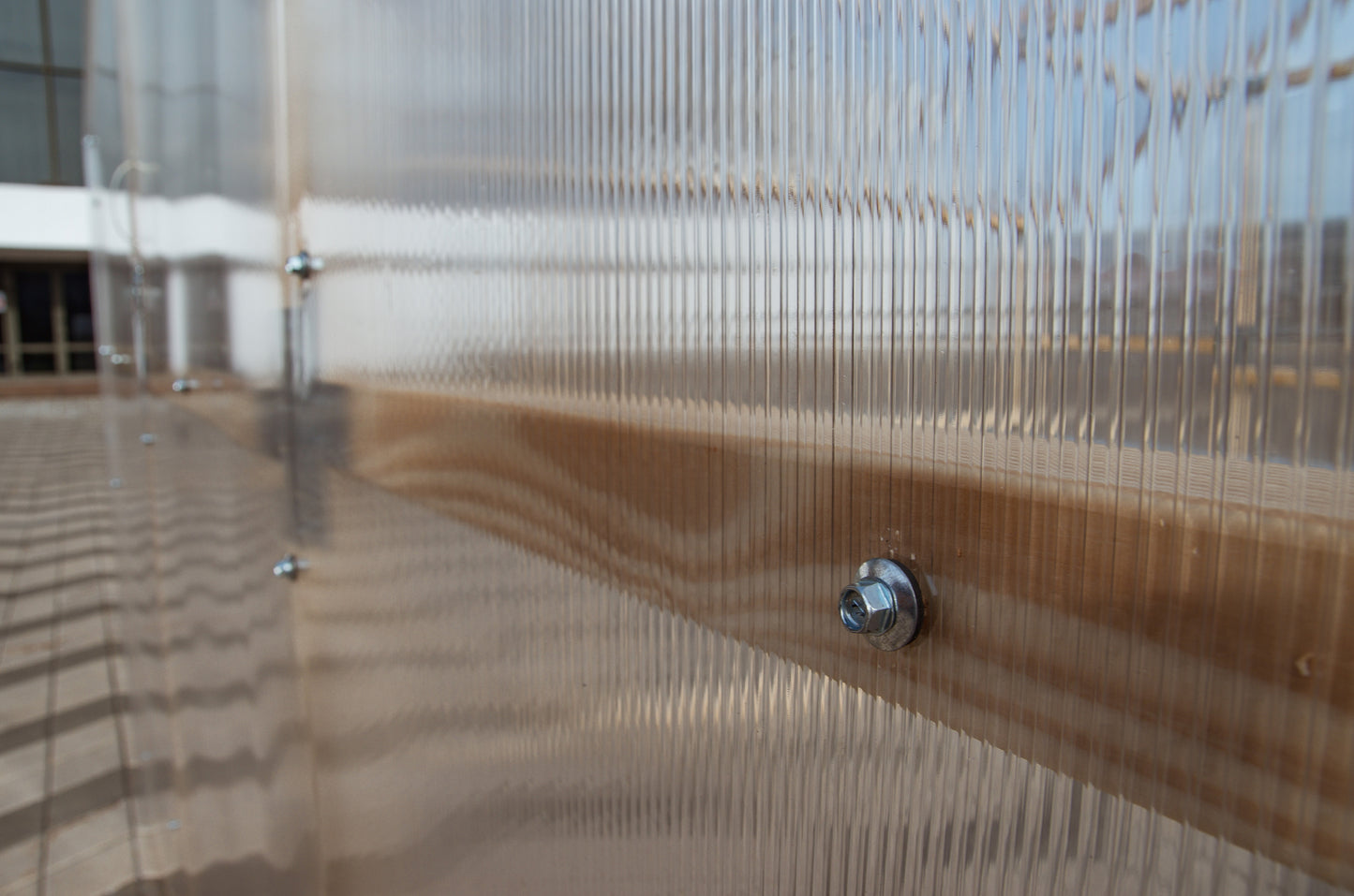 Casa Wooden Greenhouse — timber frame screw detail close-up