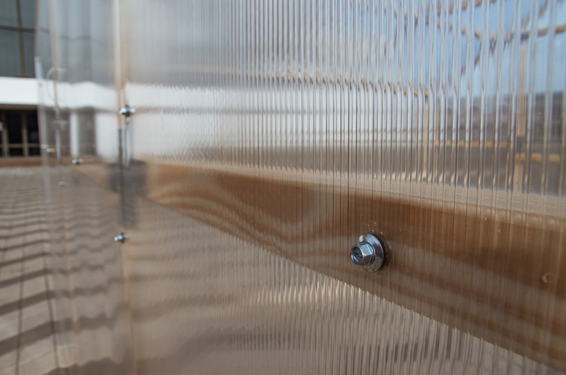 Casa Wooden Greenhouse — timber frame screw detail close-up
