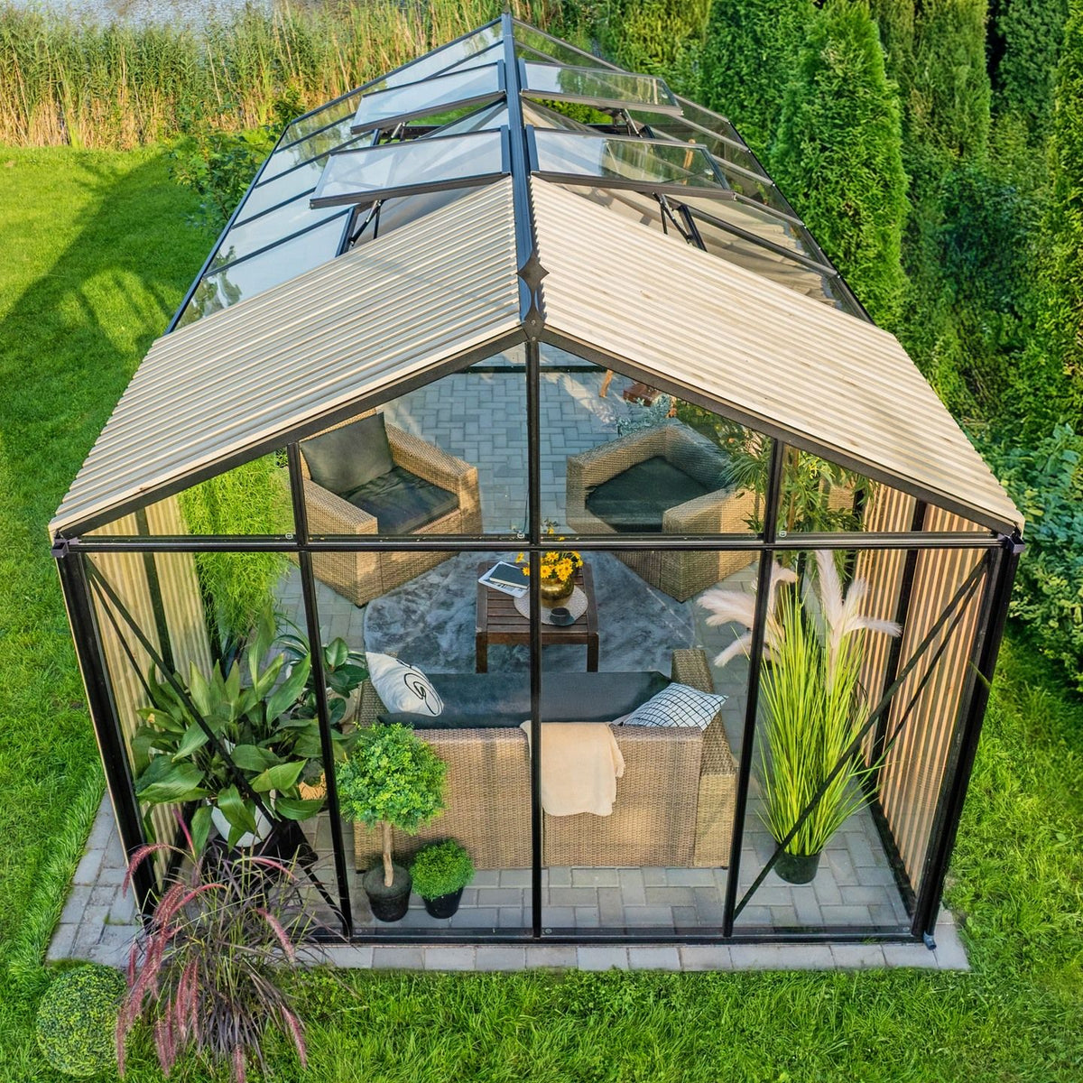 Customer Aurora Classic XL — black wood modern lounge greenhouse